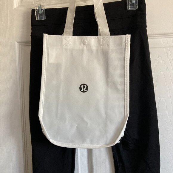 Lululemon black carpi workout pants with bag - Picture 3 of 6